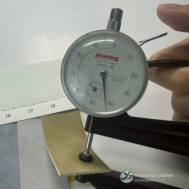 YX-091 individual swatch in a thickness gauge